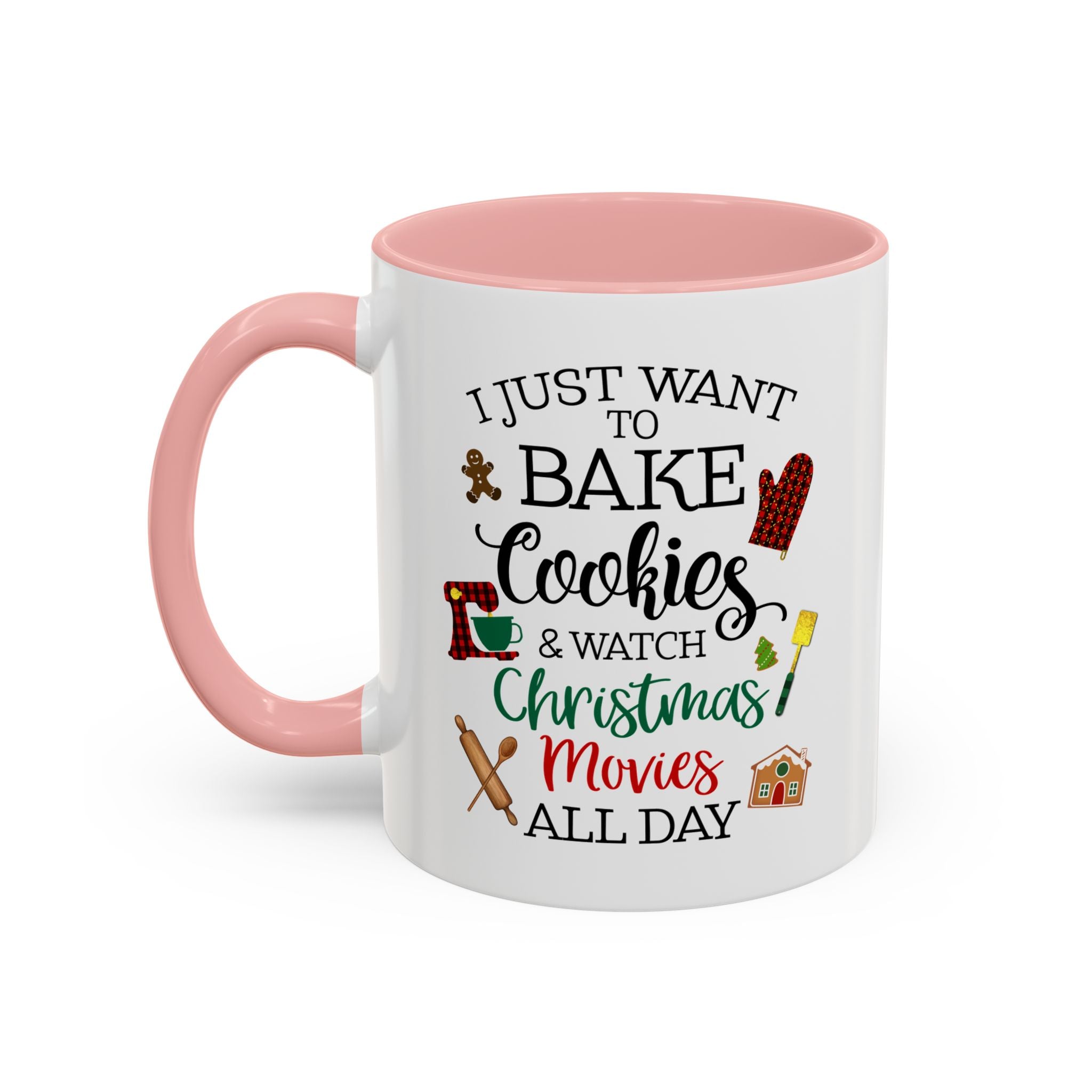 White 11 oz ceramic mug with pink interior and handle featuring a festive Christmas quote about baking cookies and watching Christmas movies.