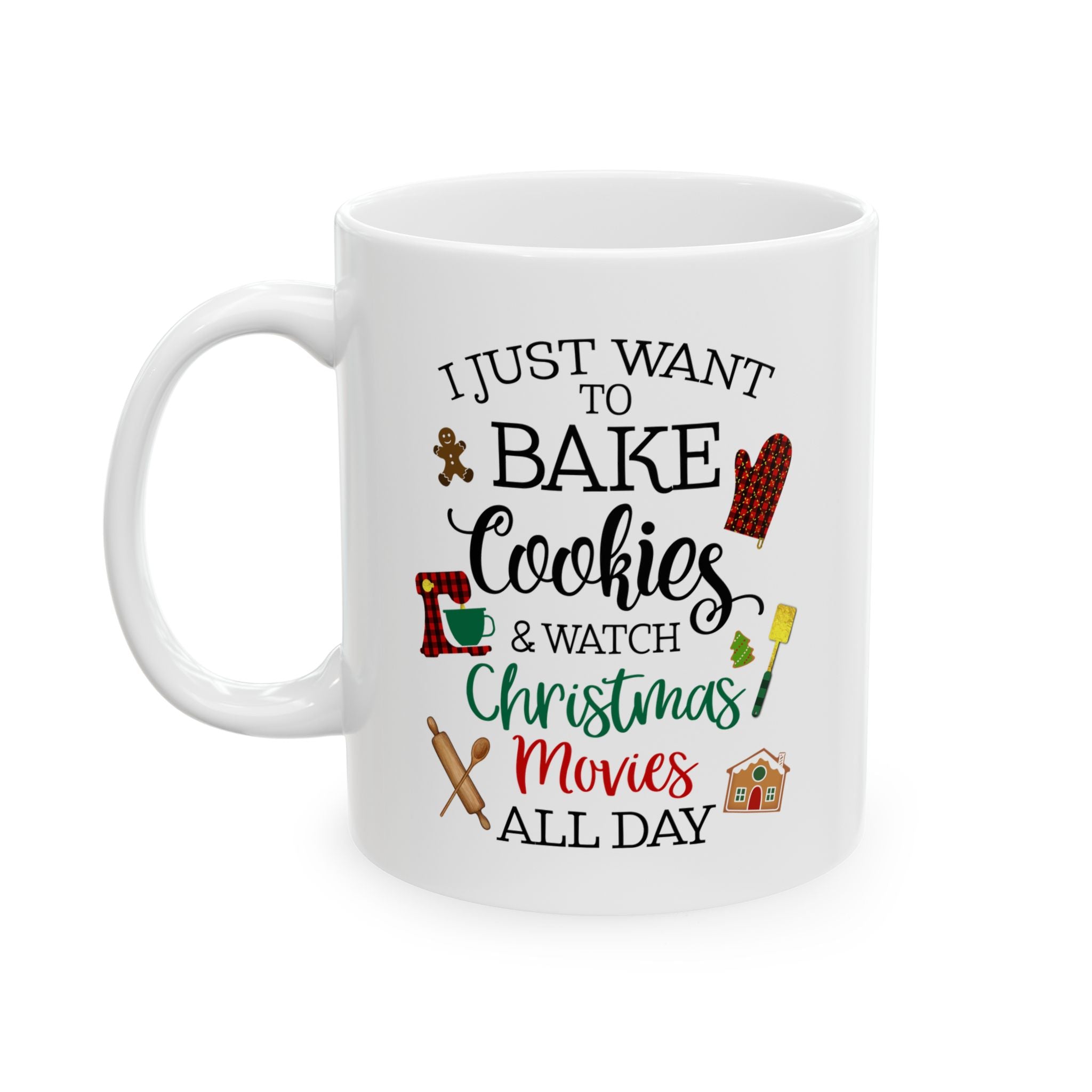 White ceramic mug with festive Christmas design and the phrase “I just want to bake cookies & watch Christmas movies all day,” featuring gingerbread, oven mitt, rolling pin, and holiday icons.