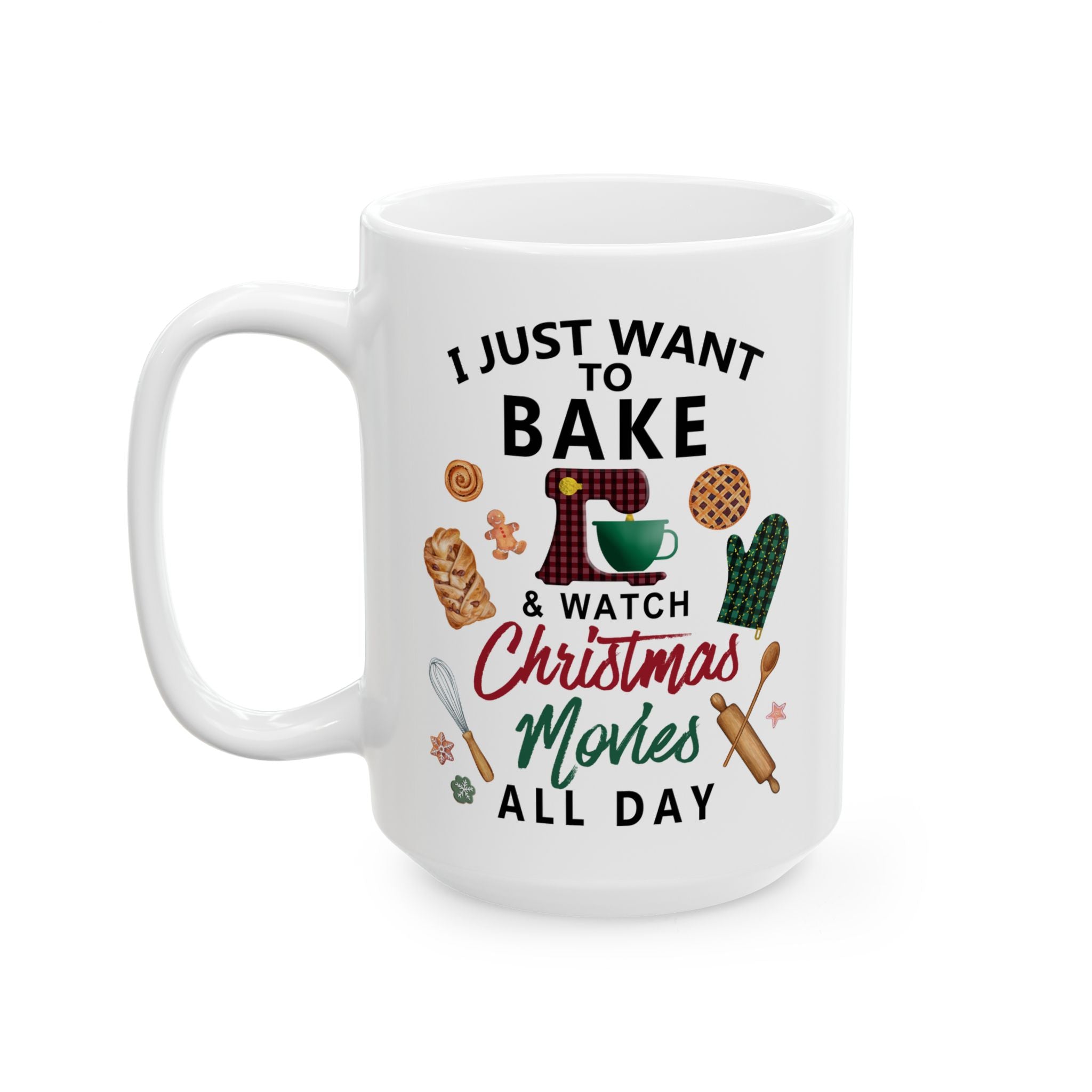White ceramic Christmas mug with festive baking icons and the quote “I Just Want to Bake & Watch Christmas Movies All Day.”