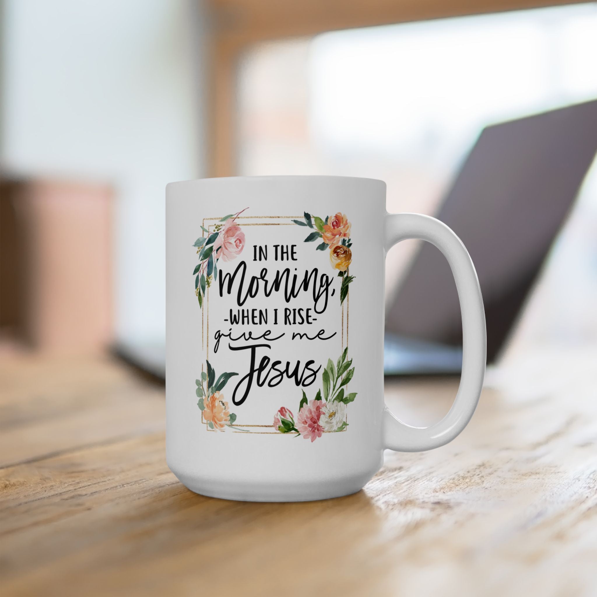 White mug with floral design and text on a wooden surface, faith mug